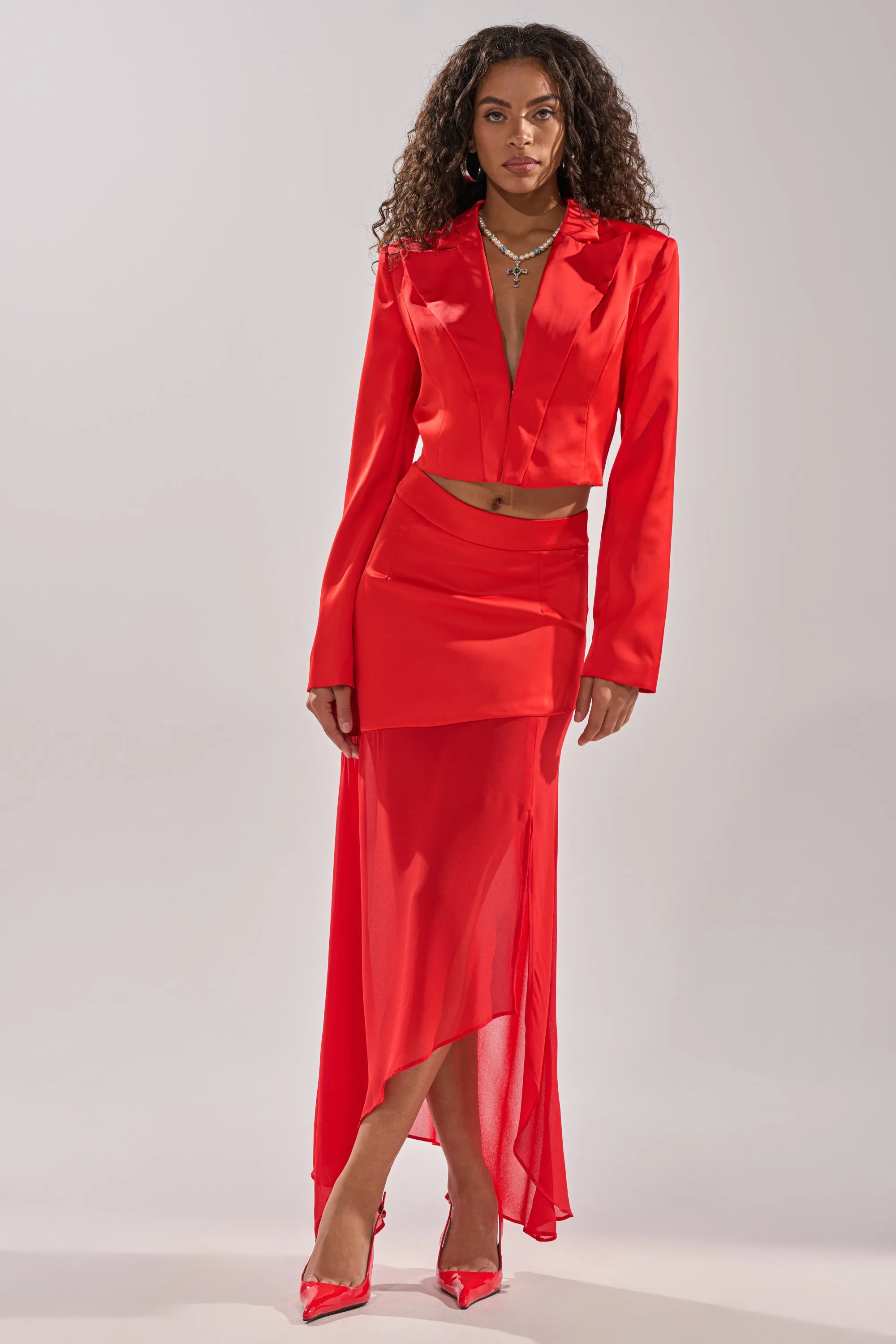 RED HOT ASYMMETRICAL MIDI SKIRT sold by AKIRA