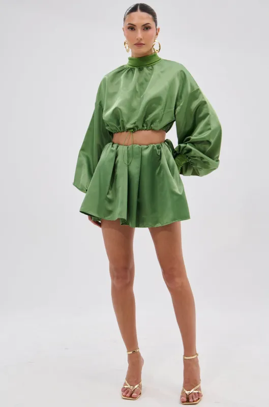 POP IT OFF MINI SKIRT sold by AKIRA