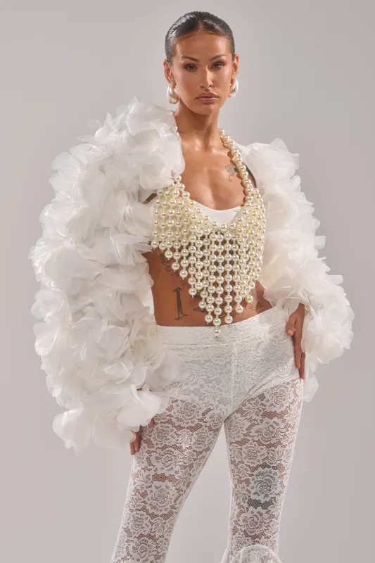 CHIARA FLORAL SHRUG sold by AKIRA