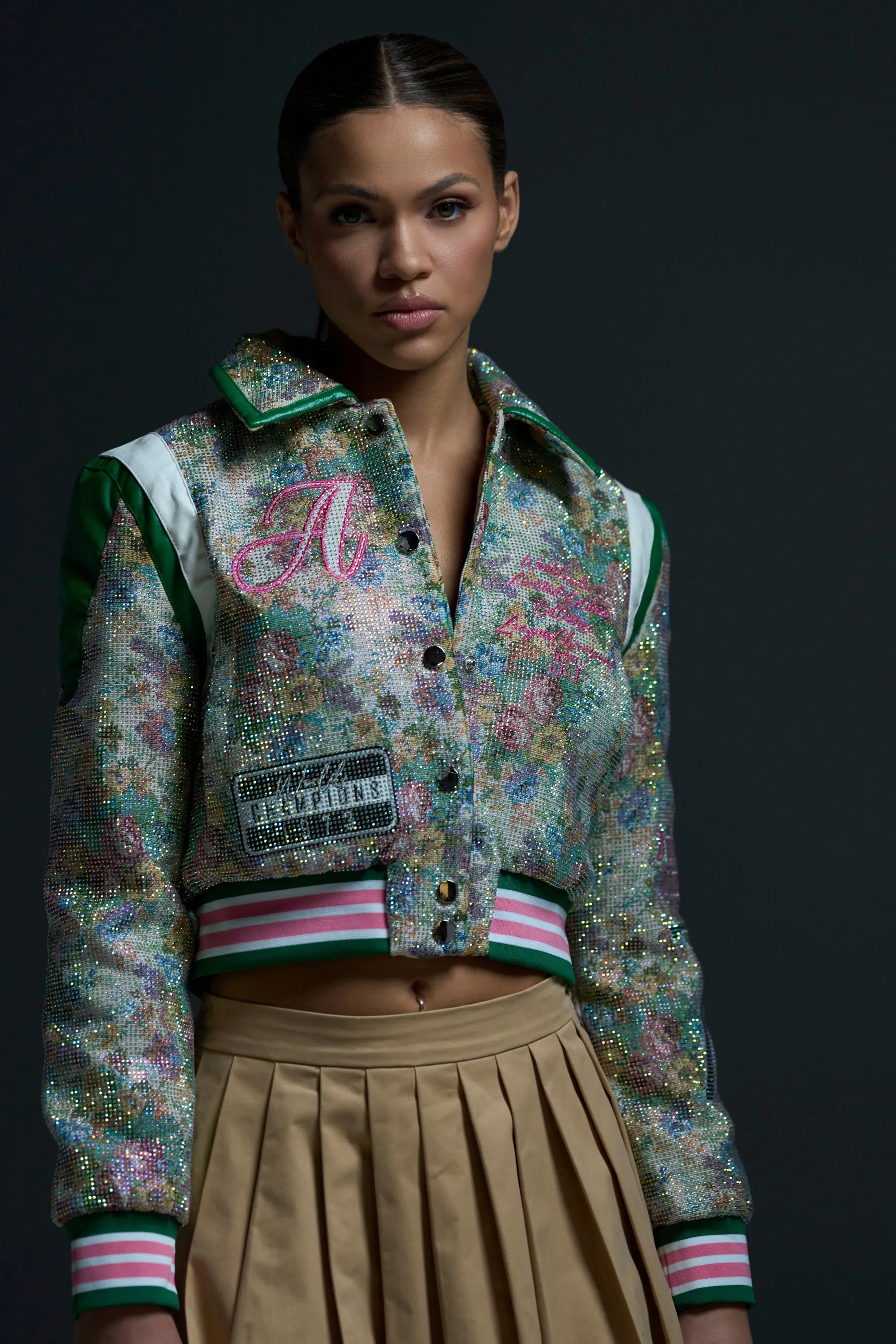 TAPPED OUT RHINESTONE BOMBER sold by AKIRA