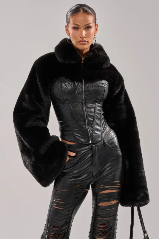 SHORTY CORSETED FAUX FUR sold by AKIRA