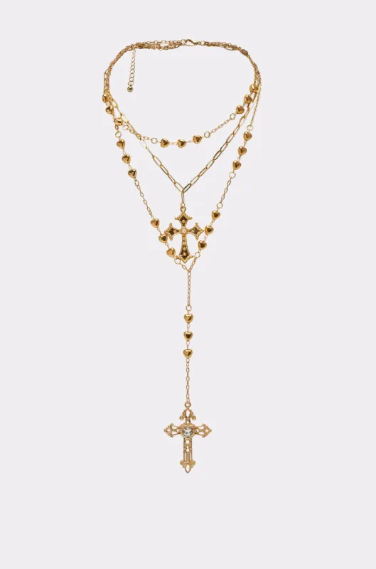 DRIPPED OUT CROSS LARIAT sold by AKIRA