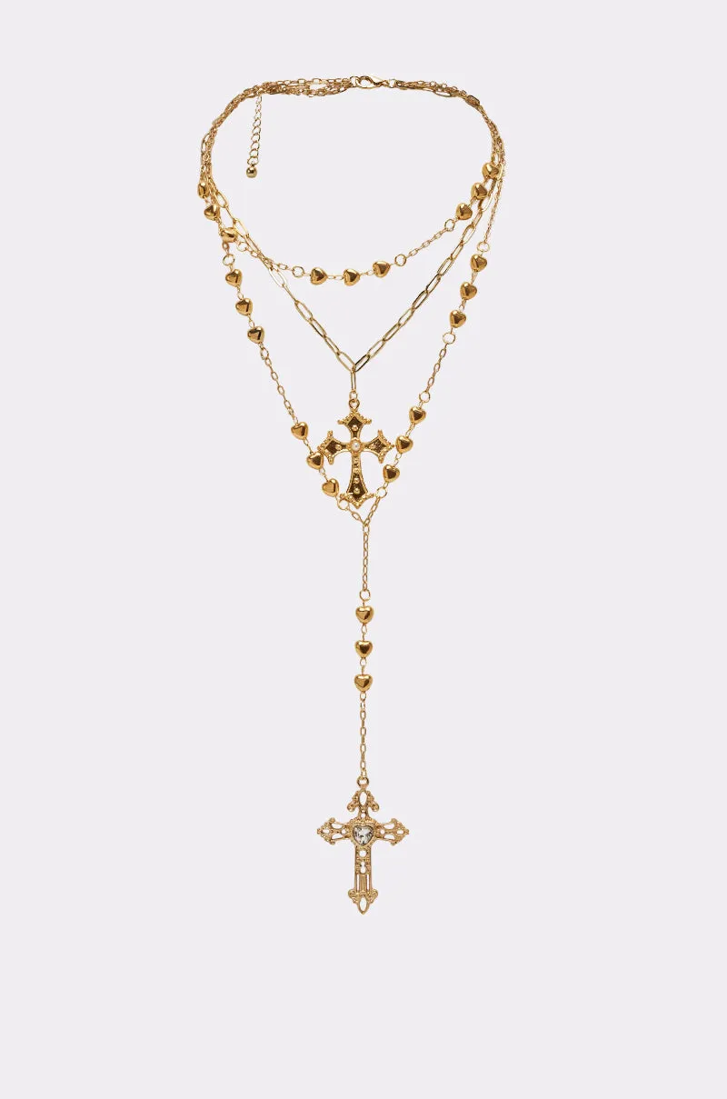 DRIPPED OUT CROSS LARIAT sold by AKIRA