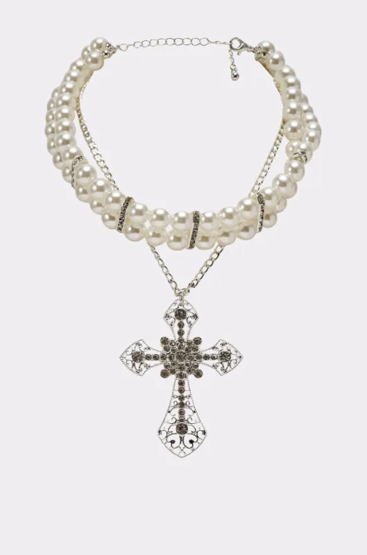 PURE CROSS NECKLACE sold by AKIRA
