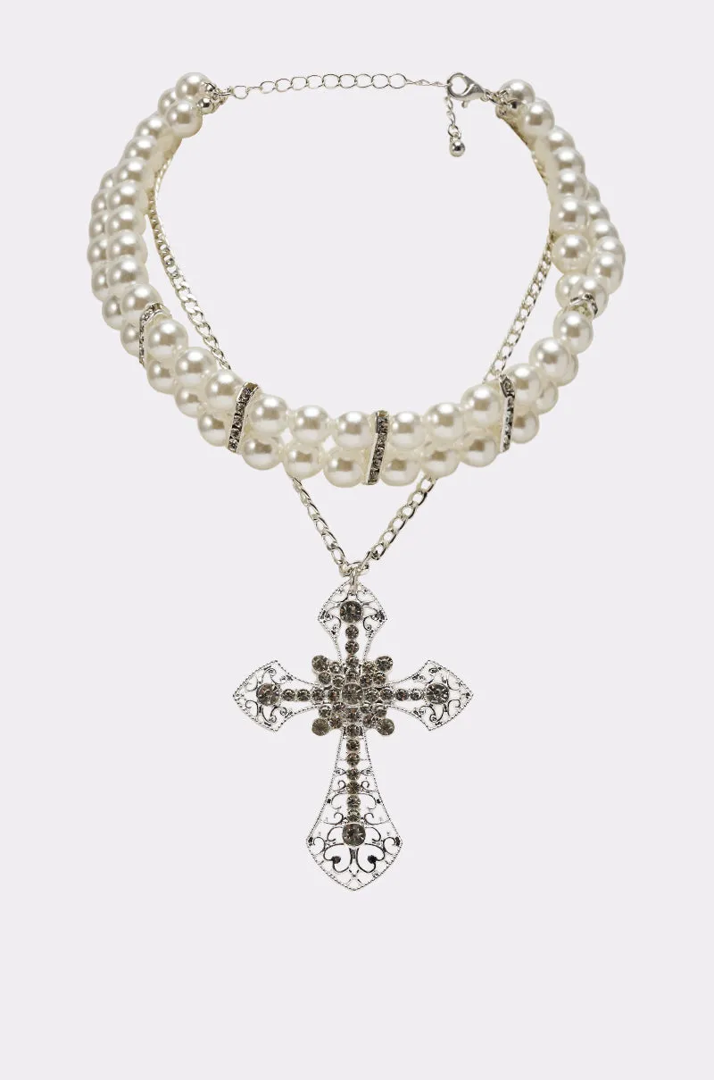 PURE CROSS NECKLACE sold by AKIRA