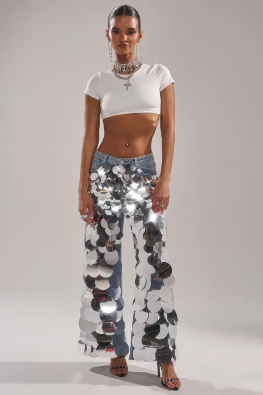 CHECK IT OUT SEQUIN DENIM PANT sold by AKIRA