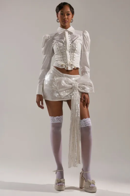 SHINING DOWN ON YOU SEQUIN MINI SKIRT sold by AKIRA