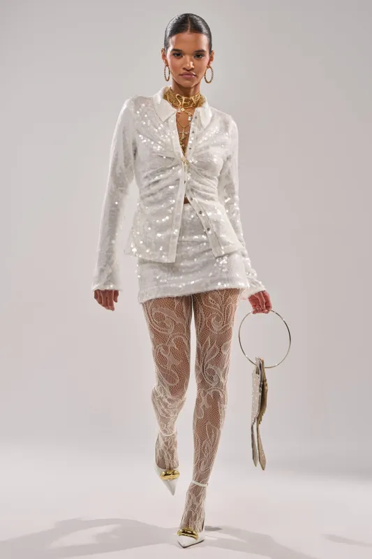 YOU AND ME SEQUIN MINI SKIRT sold by AKIRA