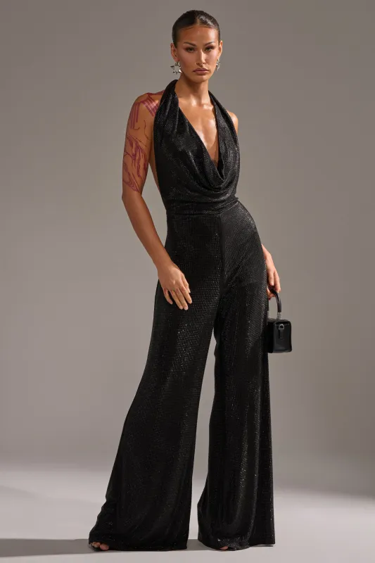 MAKE YOU DO A DOUBLE TAKE RHINESTONE JUMPSUIT IN BLACK sold by AKIRA