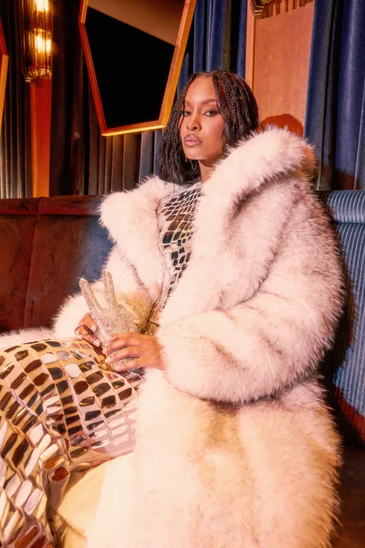 HEAVY ON THE APRES FAUX FUR COAT sold by AKIRA