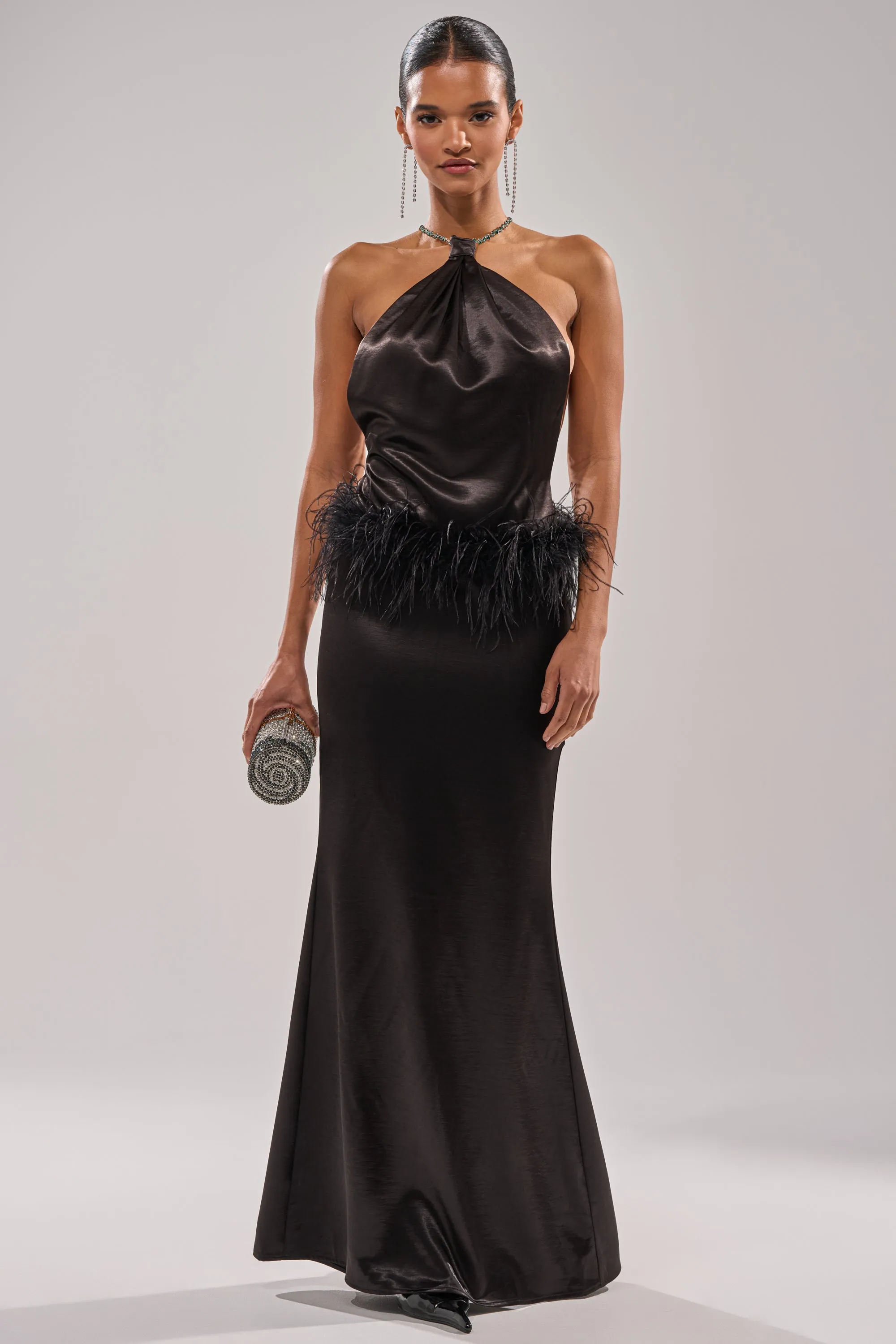 WHO IS SHE SATIN FEATHER MAXI DRESS IN BLACK sold by AKIRA