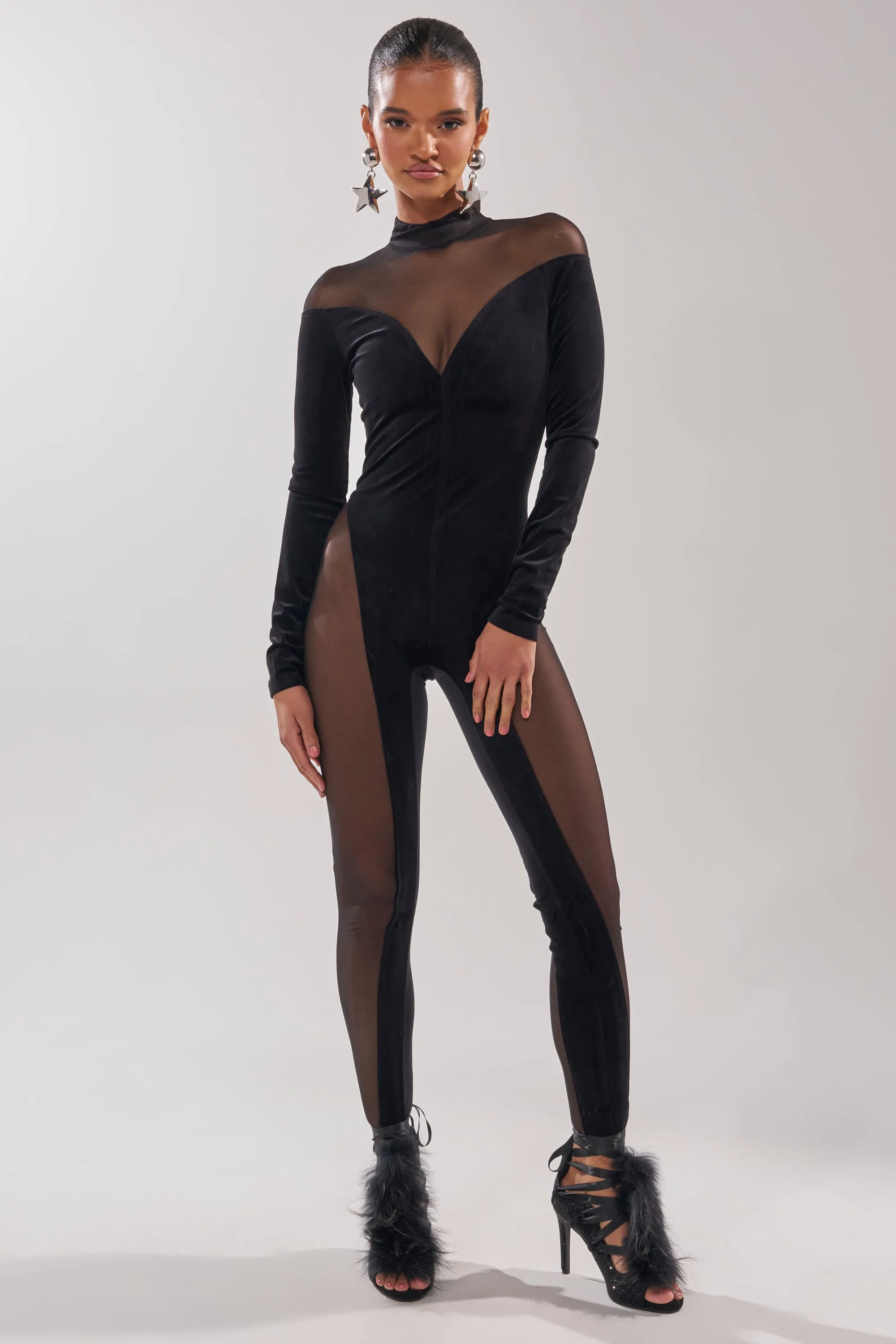 MESH TO IMPRESS LONG SLEEVE JUMPSUIT sold by AKIRA