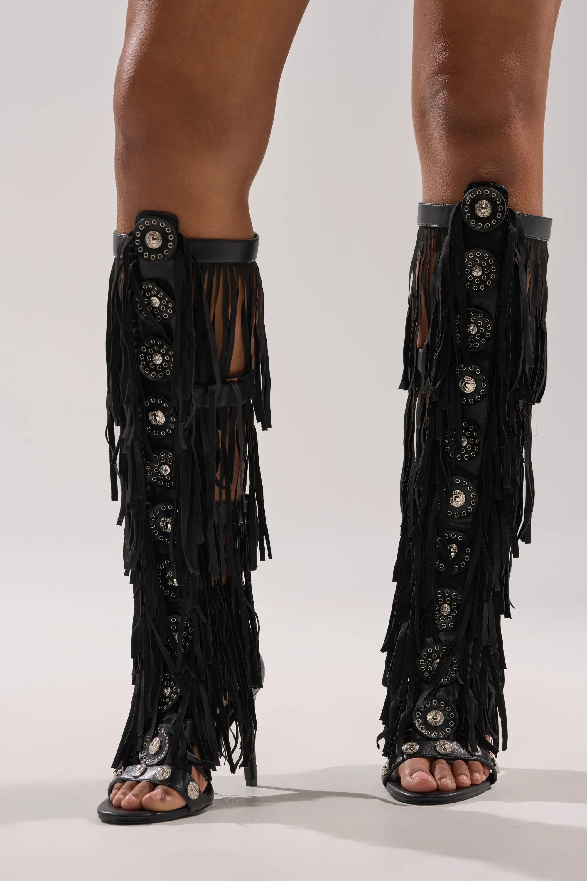 AZALEA WANG SAMEYANA BLACK FRINGE AND METAL STILETTO GLADIATOR SANDAL sold by AKIRA