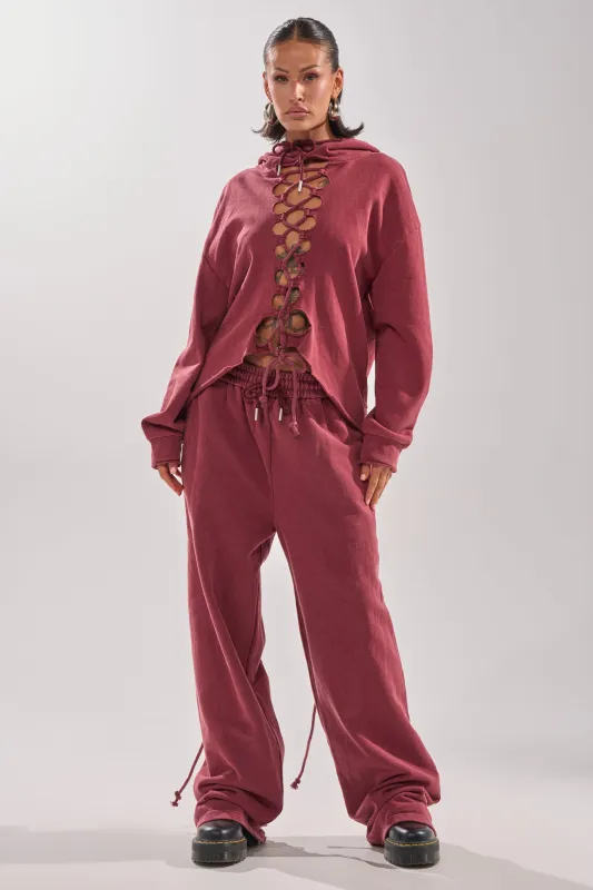 LACED UP FOR GOOD JOGGER IN PLUM sold by AKIRA