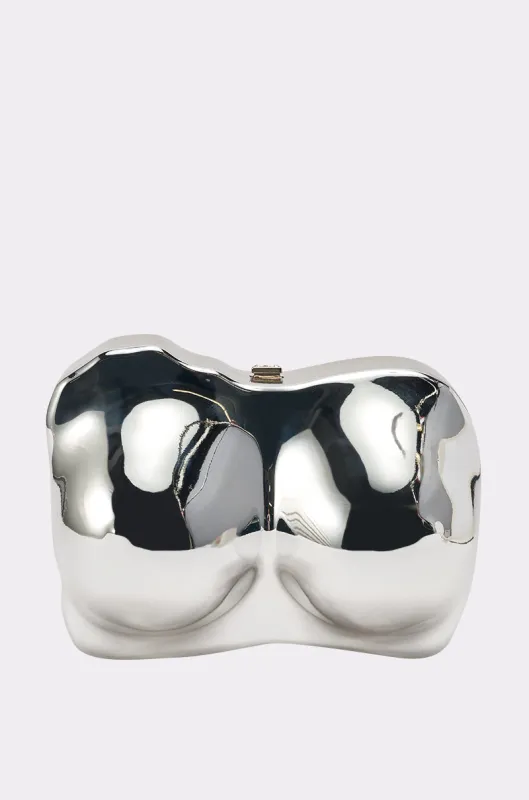 A BIT BUSTY CLUTCH sold by AKIRA