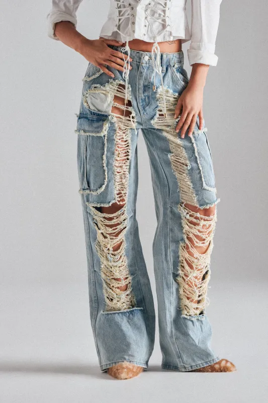 ALMA DISTRESSED DENIM CARGO PANTS sold by AKIRA