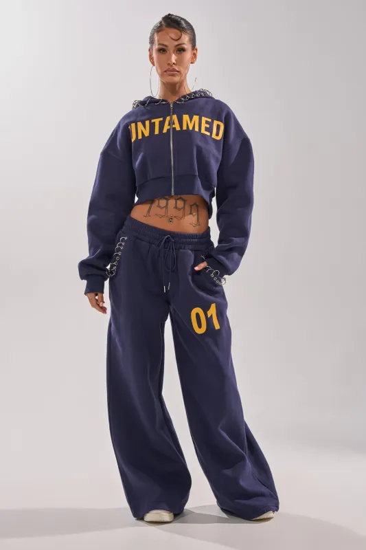 UNTAMED METAL RING JOGGER sold by AKIRA