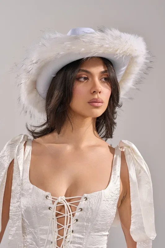 LETS RIDE FAUX FUR TRIM COWBOY HAT sold by AKIRA