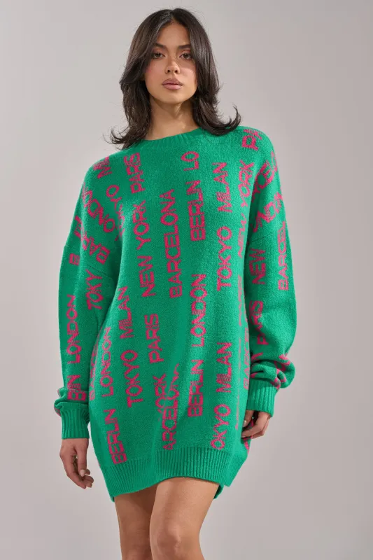 AROUND THE WORLD SWEATER MINI DRESS IN GREEN made by AKIRA