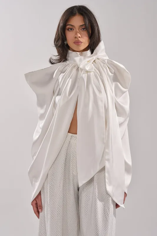 WRAPPED IN LOVE BLOUSE sold by AKIRA