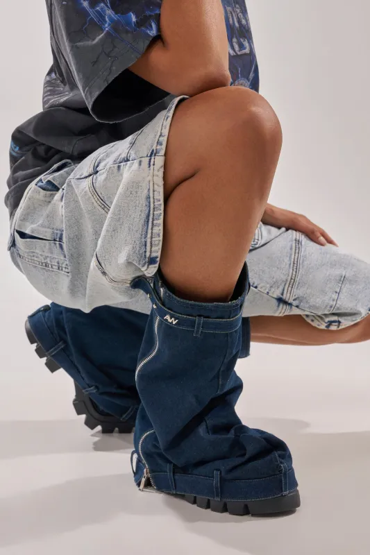 AKIRA GOLD ANGELA FOLD OVER PLATFORM BOOT IN DARK DENIM sold by AKIRA