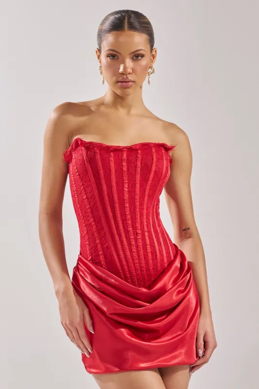 SPOIL ME LACE MINI DRESS IN RED sold by AKIRA