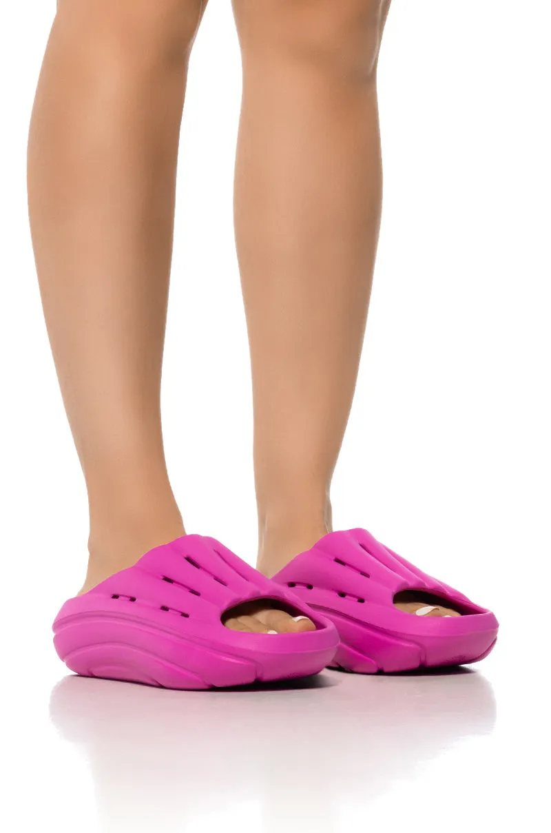 1136880 DRAGONFRUIT UGG SLIDE sold by AKIRA