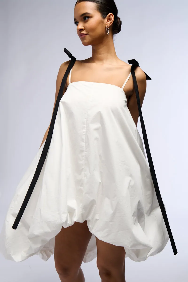 CUTIE GIRL POPLIN MINI DRESS WITH BOW DETAILS sold by AKIRA