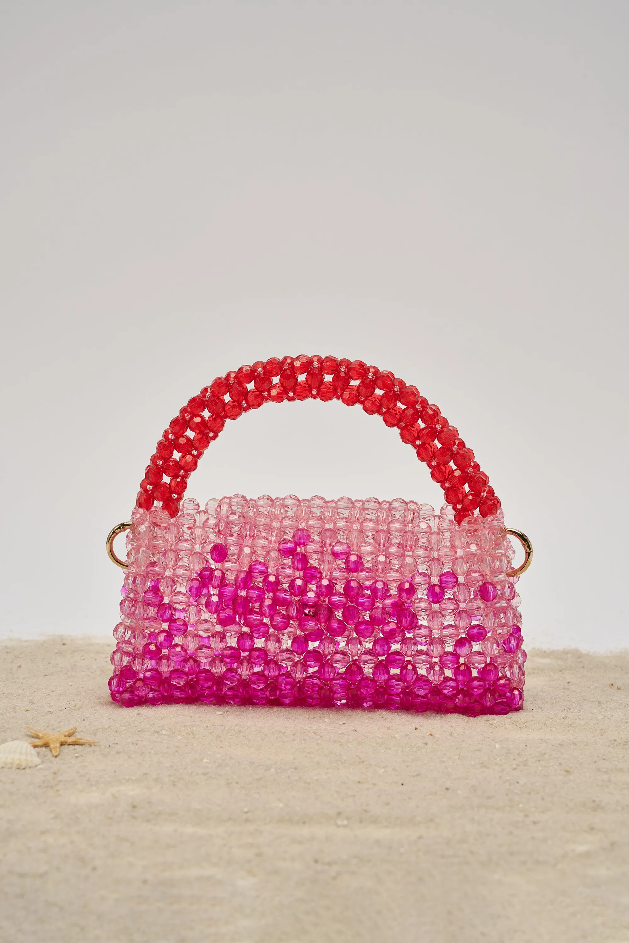 IN THE TROPICS BEADED BAG sold by AKIRA
