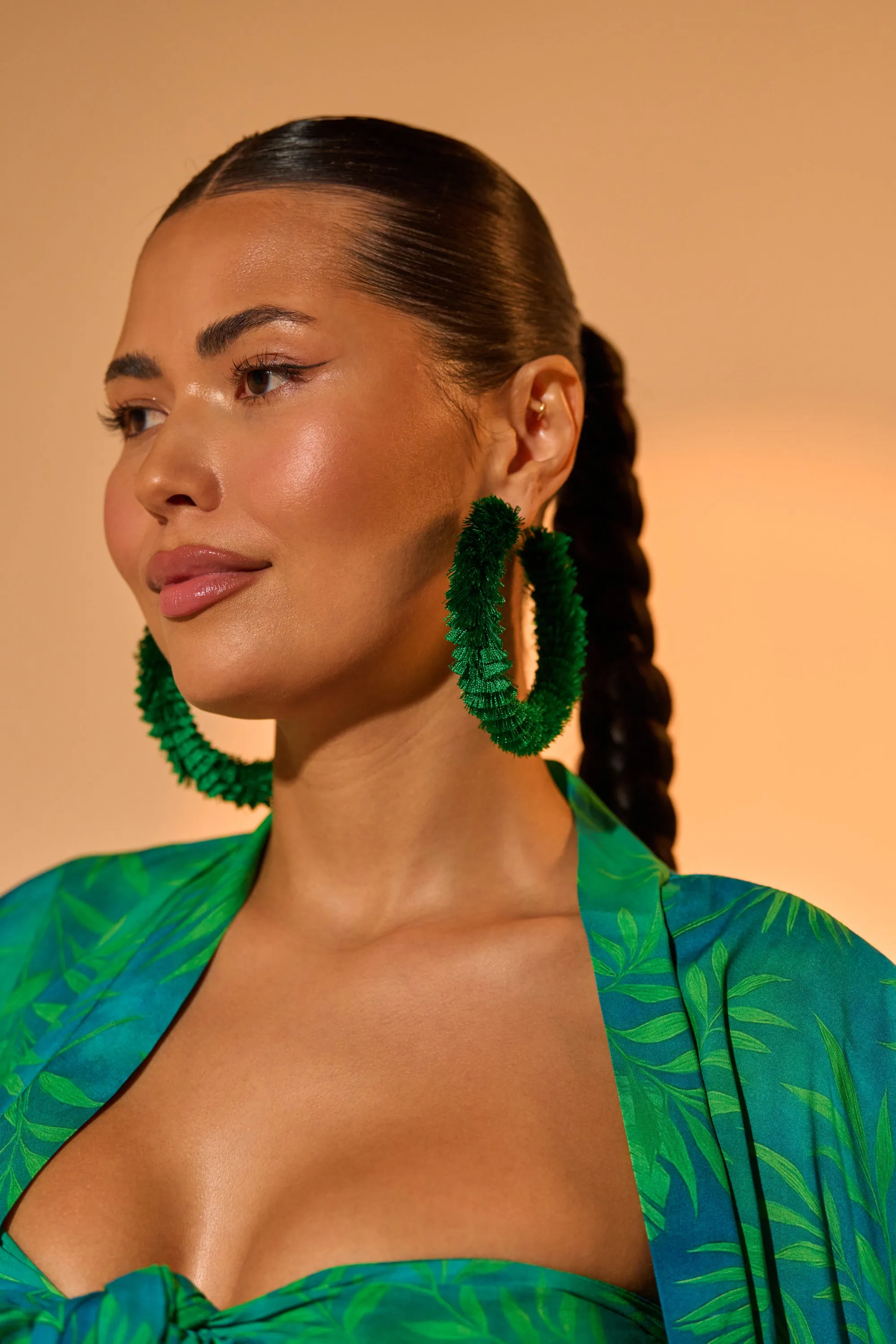 CARNIVALE EARRING sold by AKIRA