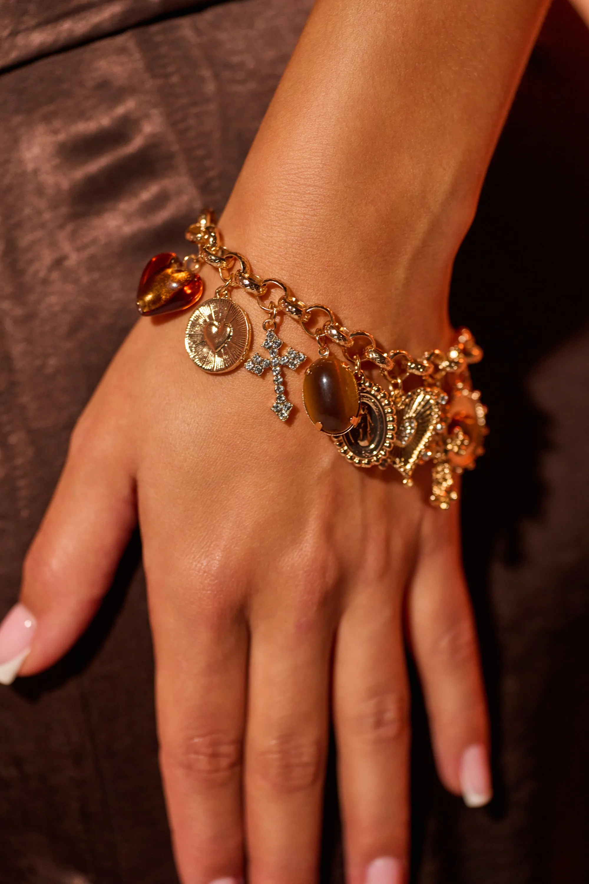 CHARM IT UP BRACELET sold by AKIRA