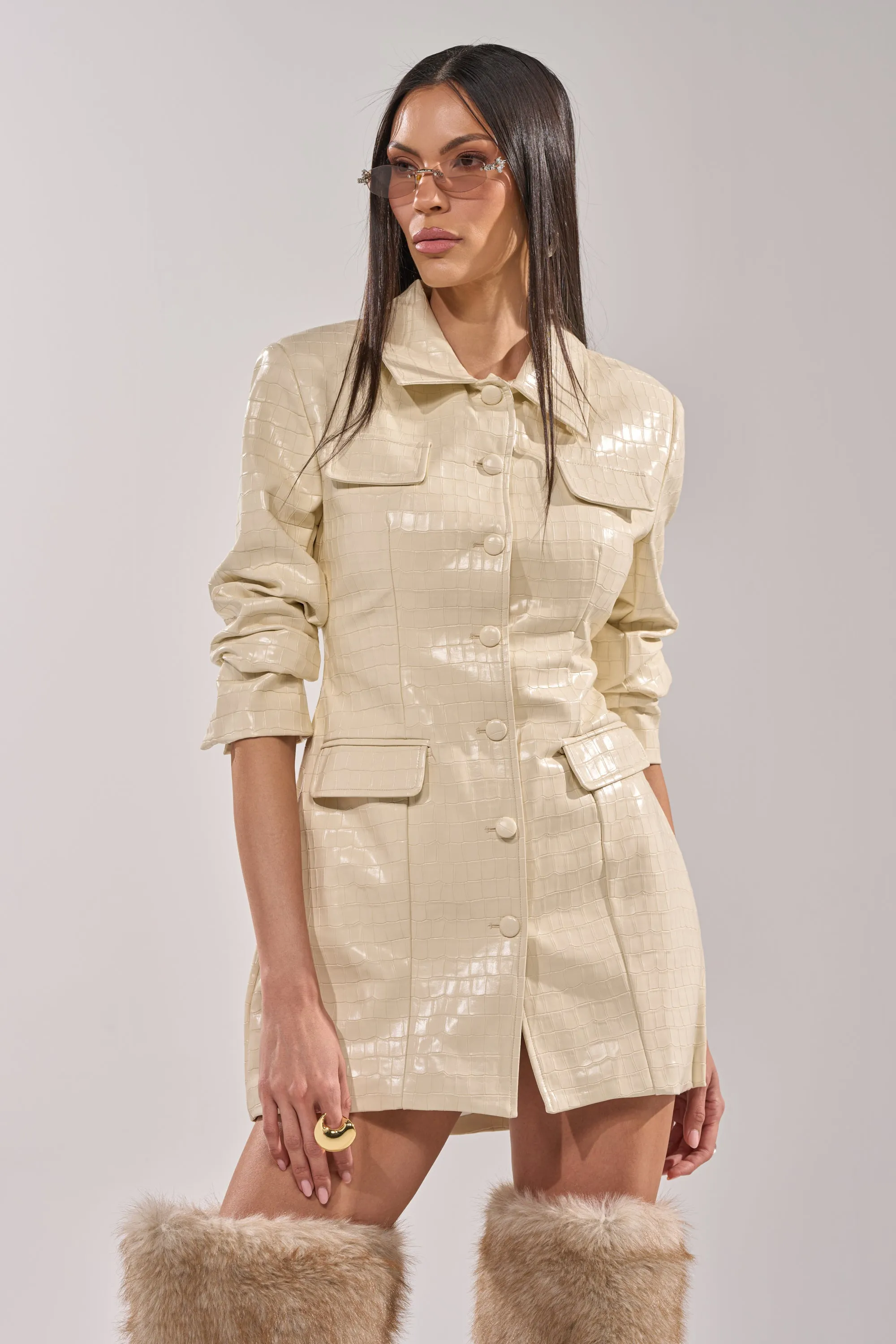 STANDING ON BUSINESS PU MINI DRESS sold by AKIRA