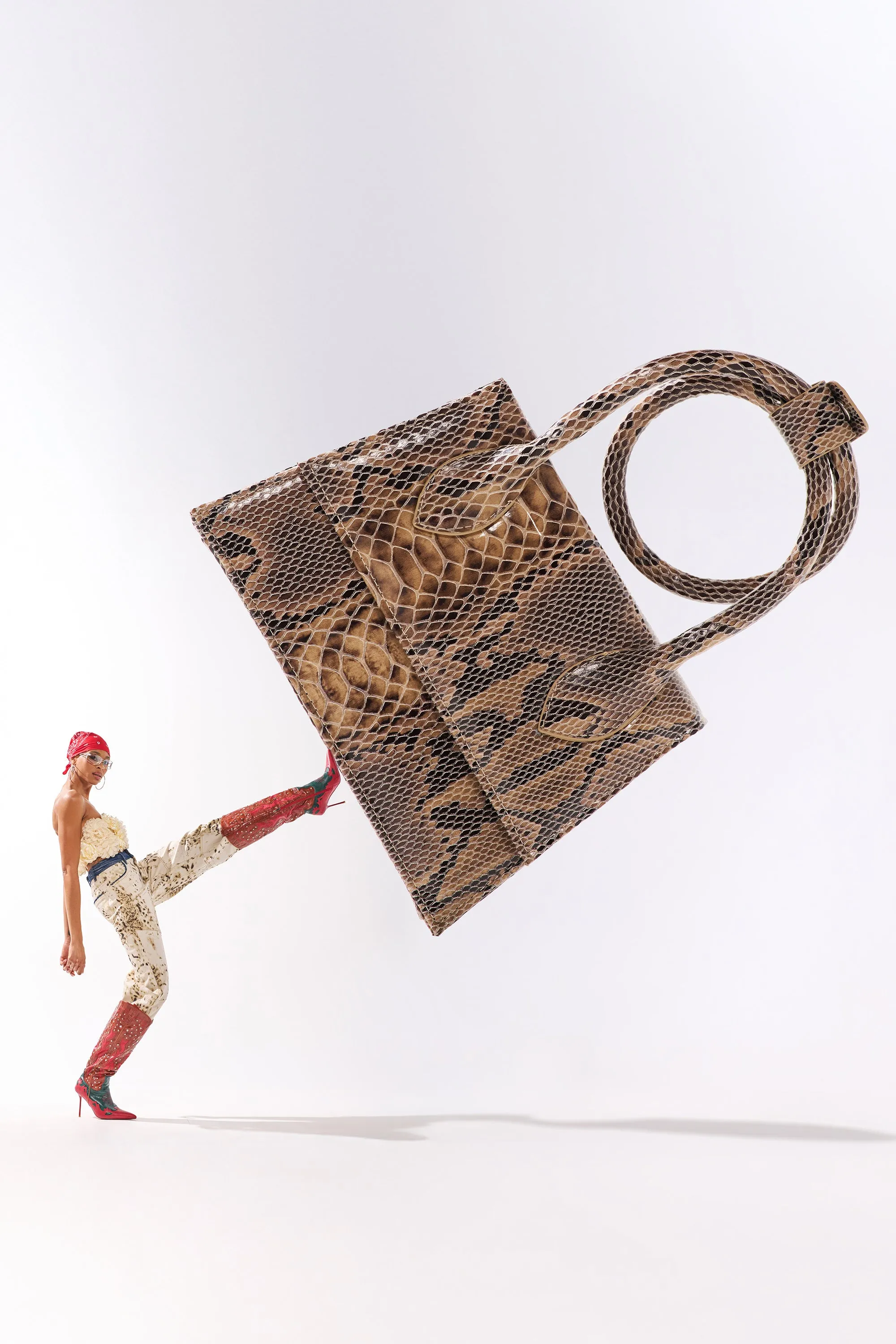 IN THE WILD PURSE sold by AKIRA