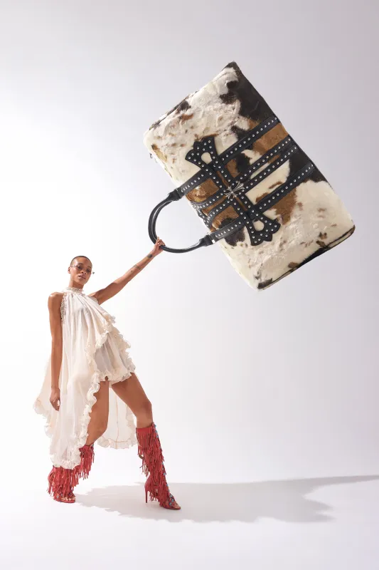 HIGH STANDARDS FAUX FUR DUFFEL sold by AKIRA