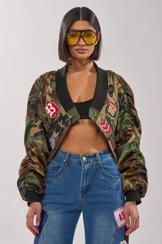 ON THE RUN CAMO BOMBER sold by AKIRA