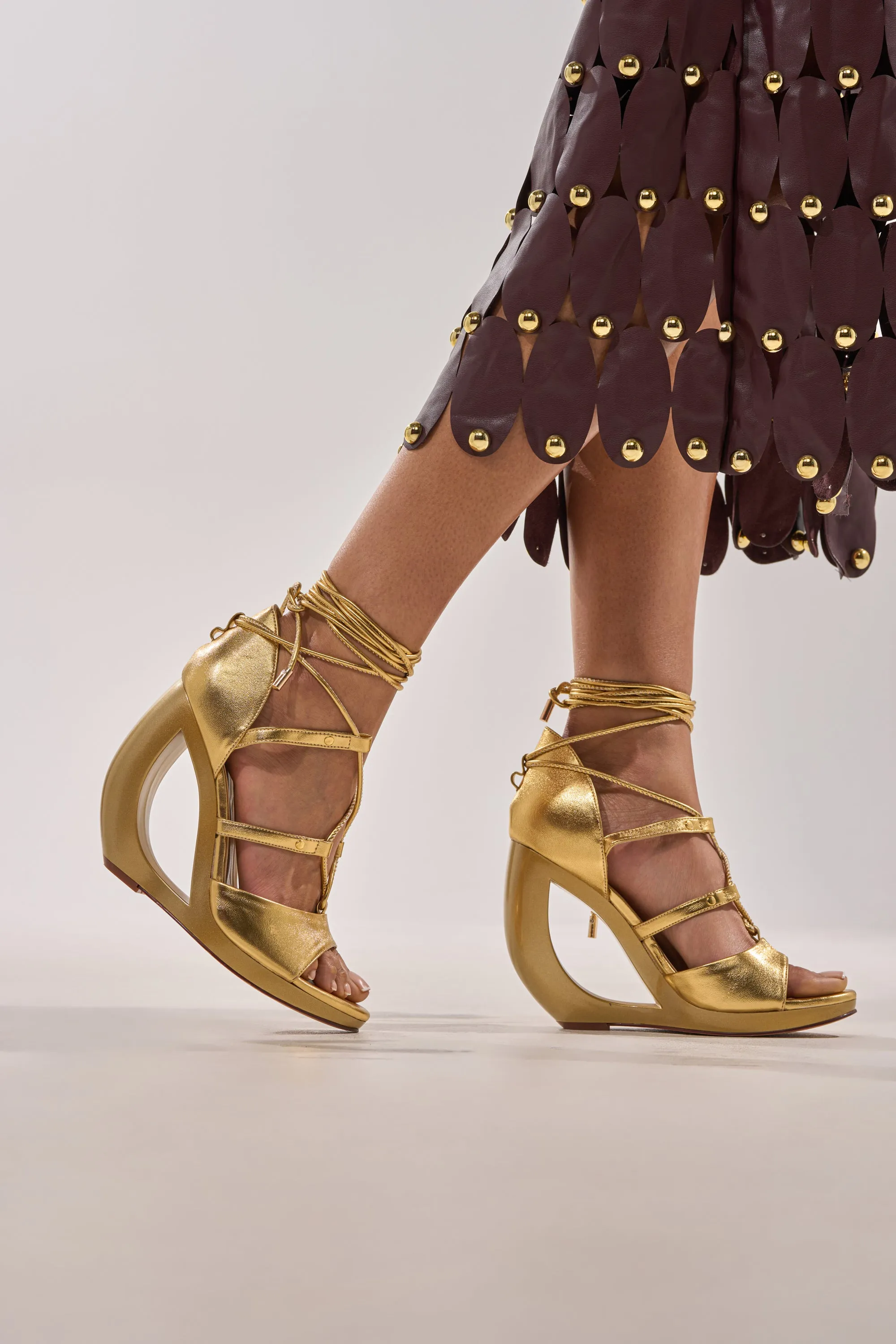 AKIRA GOLD RACHNA GOLD WEDGE OPEN TOE SANDAL sold by AKIRA