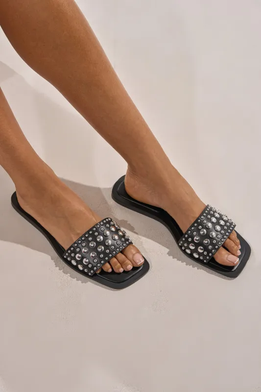 AKIRA DEVORA BLACK HARDWARE EMBELLISHED FLAT SLIP ON SANDAL sold by AKIRA