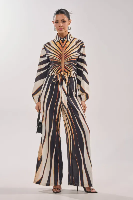 FIERCE INSTINCTS LONG SLEEVE JUMPSUIT made by AKIRA