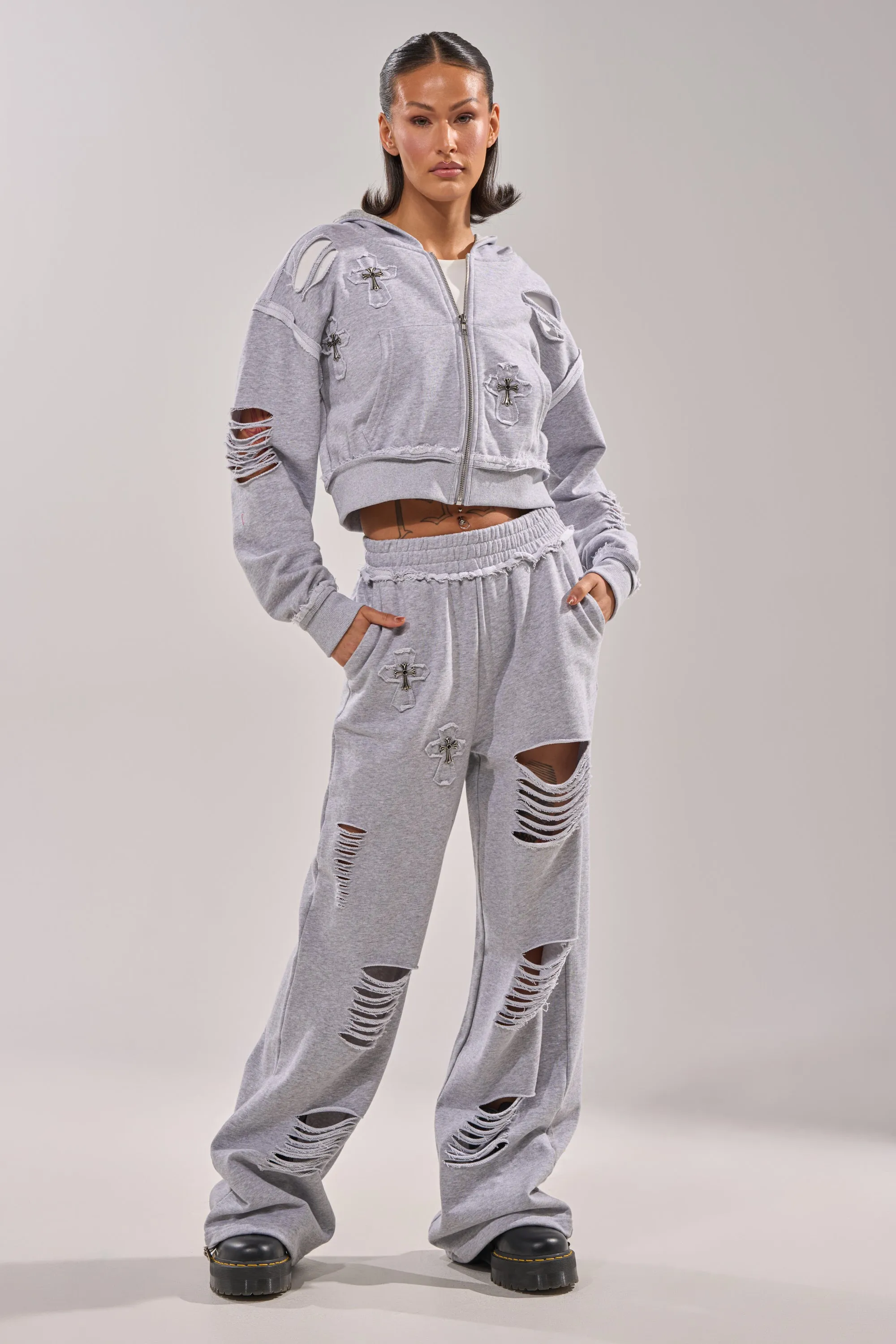 CROSSED OUT DISTRESSED WIDE LEG JOGGER sold by AKIRA