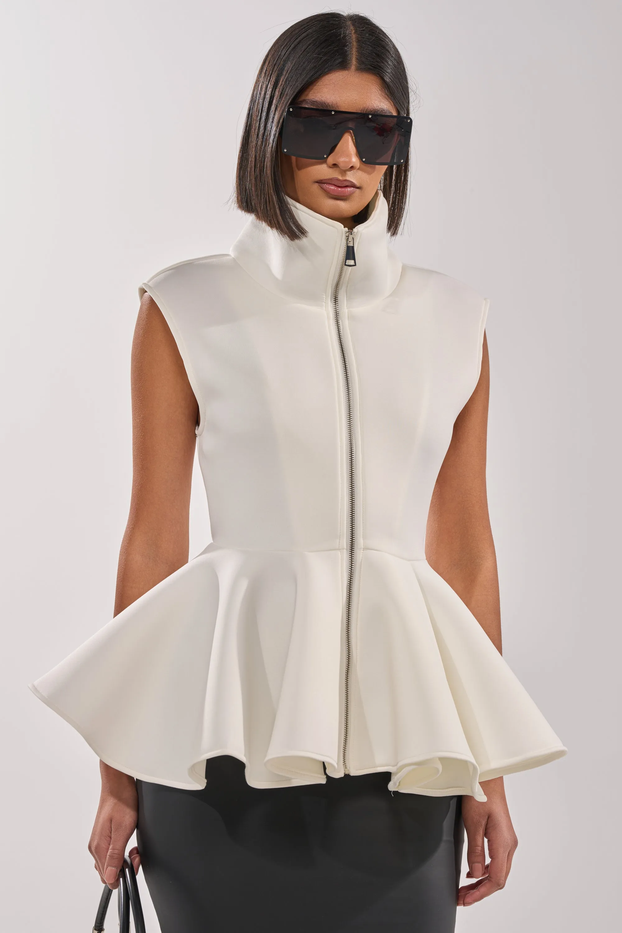 LOTTIE NEOPRENE PEPLUM VEST sold by AKIRA