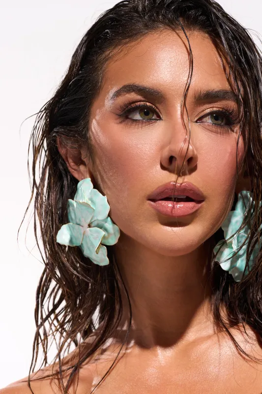 FLOWER POWER BLUE EARRING sold by AKIRA