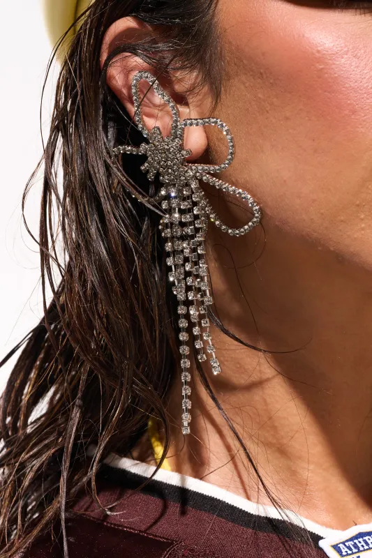 CHECK MY DRIP EARRING sold by AKIRA