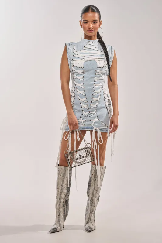 ALL ABOUT IT LACE UP MINI DRESS IN LIGHT BLUE DENIM made by AKIRA