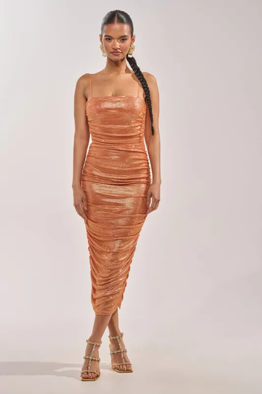KILL THE LIGHTS STRAPLESS RHINESTONE MIDI DRESS IN PEACH BELLINI made by AKIRA
