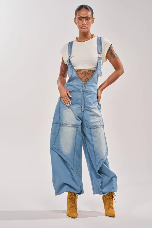 OUT TO PLAY DENIM OVERALL JUMPSUIT made by AKIRA