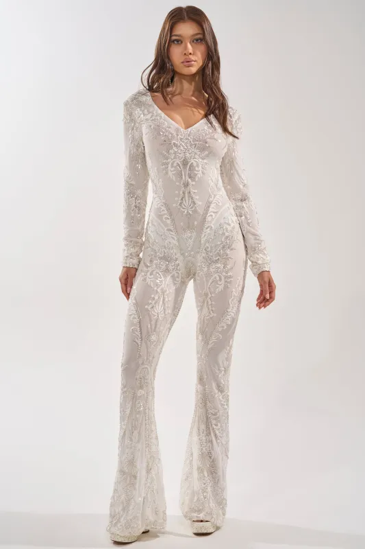 WATCH ME WORK EMBELLISHED SEQUIN JUMPSUIT IN WHITE made by AKIRA