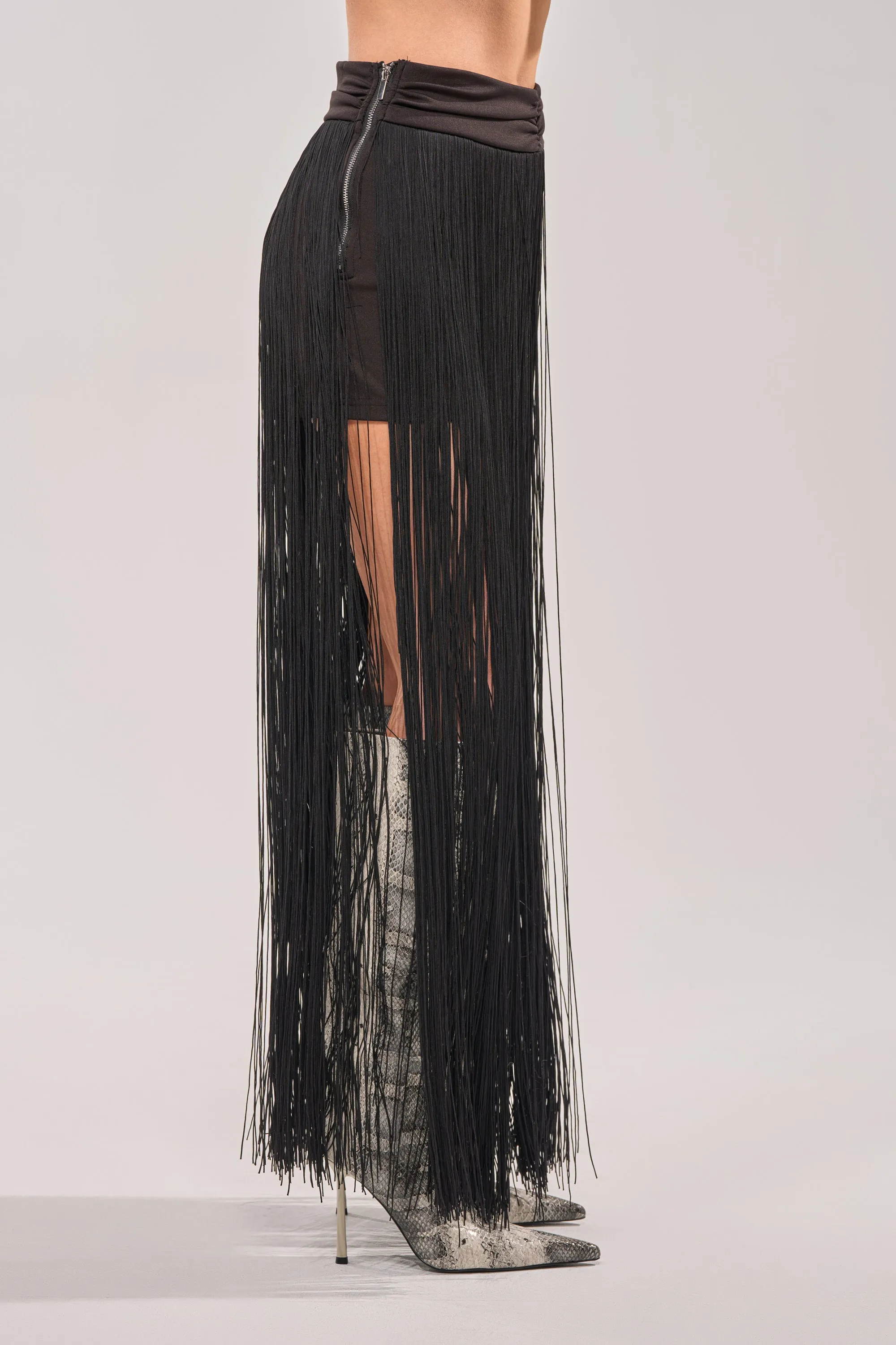 ON THE EDGE FRINGE SKIRT IN BLACK sold by AKIRA product image thumbnail 3