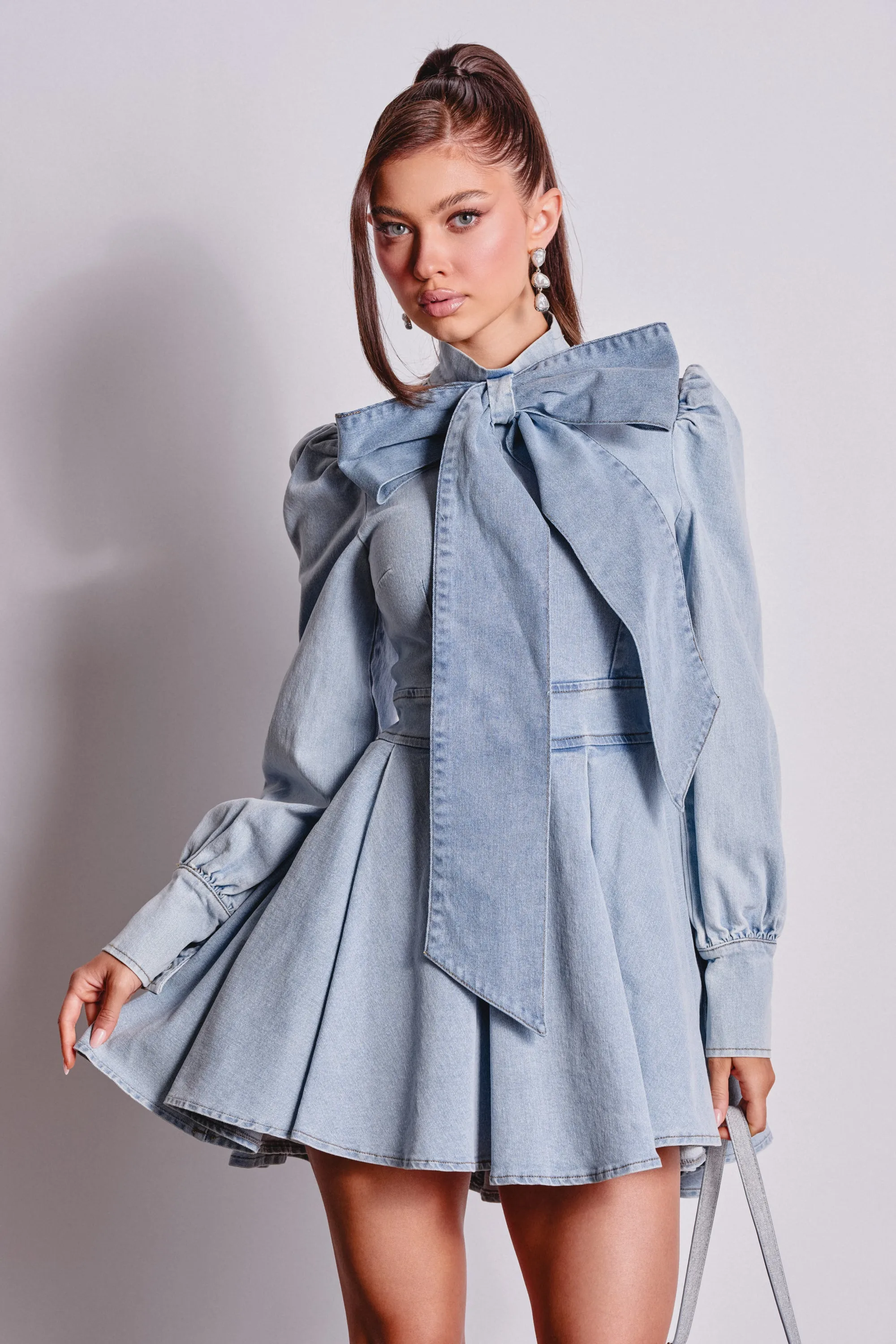CAROLINA DENIM BOW MINI DRESS sold by AKIRA