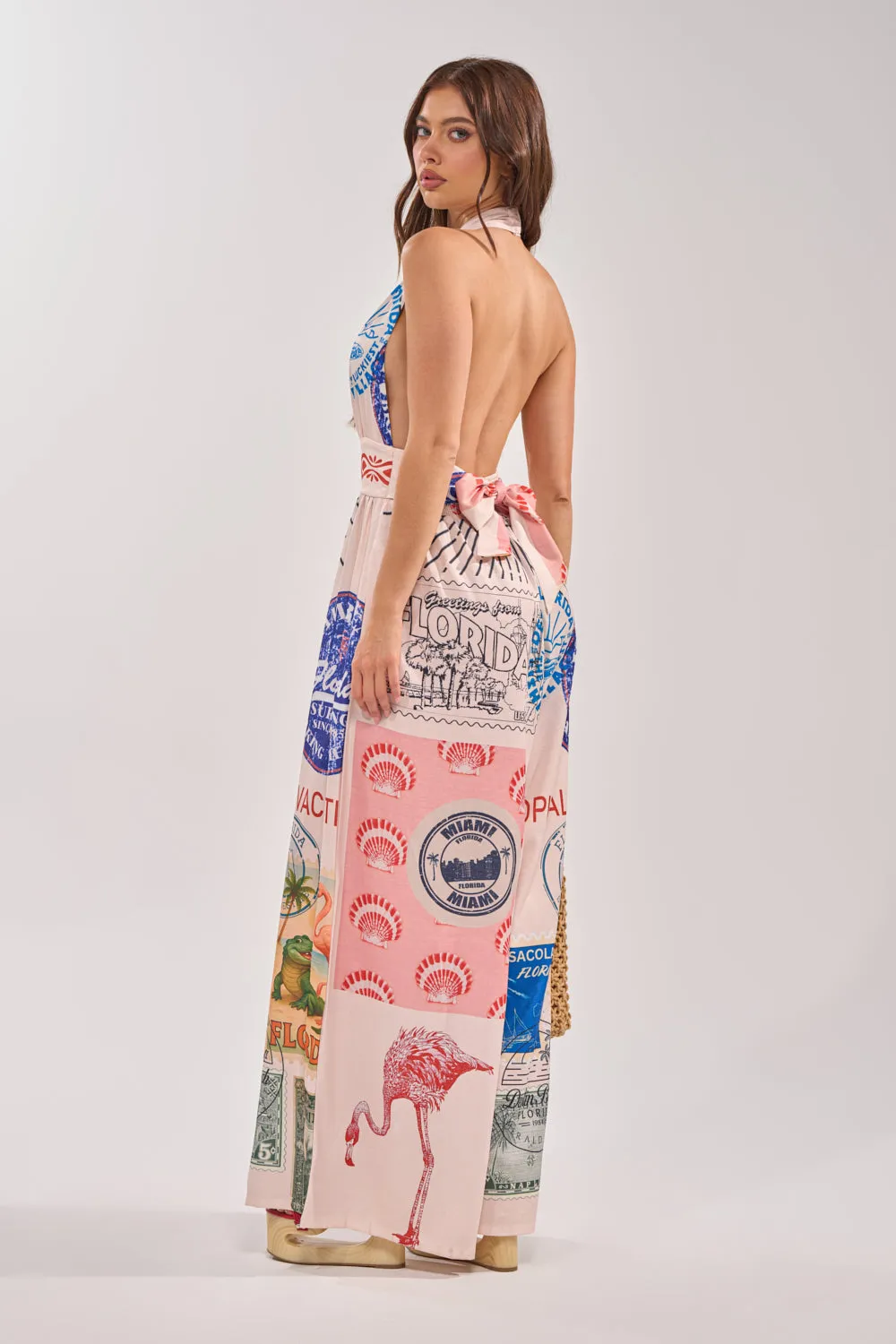 CATCH YOU LATER HALTER PRINTED JUMPSUIT sold by AKIRA product image thumbnail 4