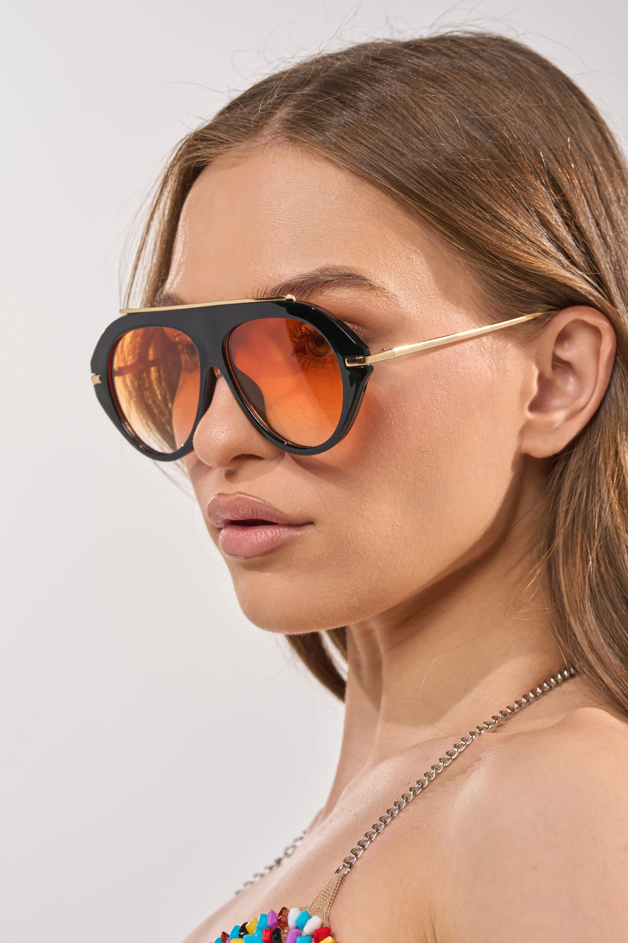LUXE AIR SUNGLASSES IN BLACK ORANGE sold by AKIRA product image thumbnail 3